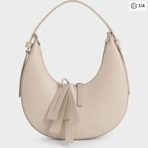 Charles & Keith Carey crescent hobo bag oat vegan leather shoulder purse